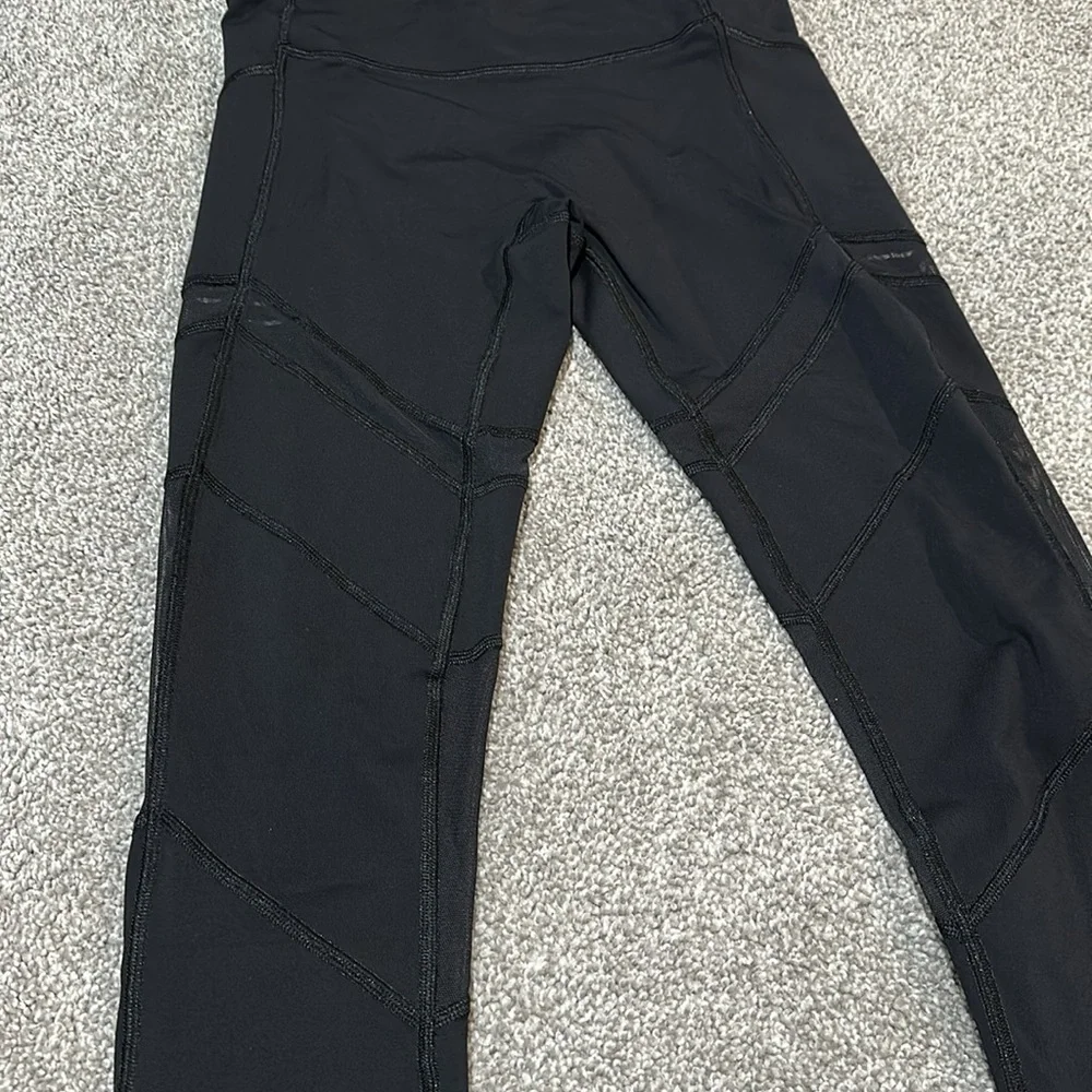 Ivivva by Lululemon black leggings with mesh and cutouts‎ girls size 12